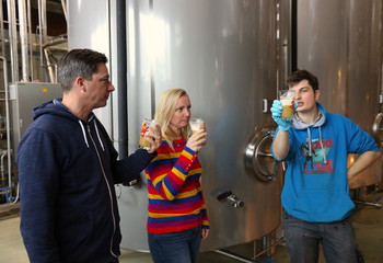 Owners Johan and Karen with brewer Dries