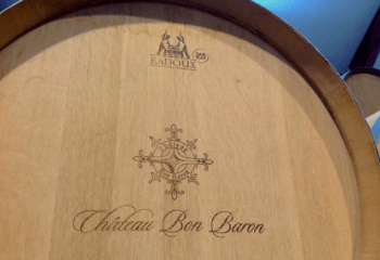 Wine barrel in the cellar of Château Bon Baron
