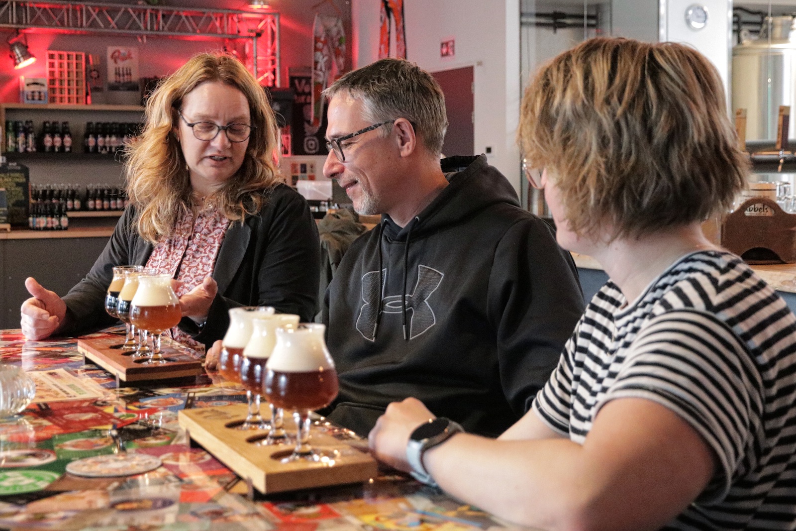 Astrid serving a tasting flight of Puik beers