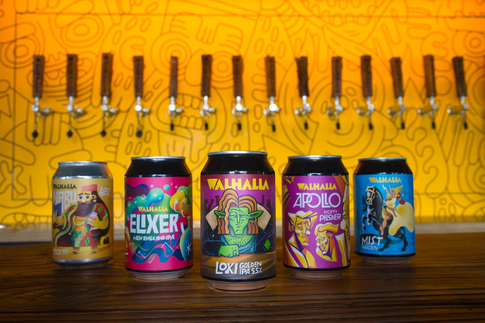 Walhalla beer cans with labels designed by Vincent Sapthu
