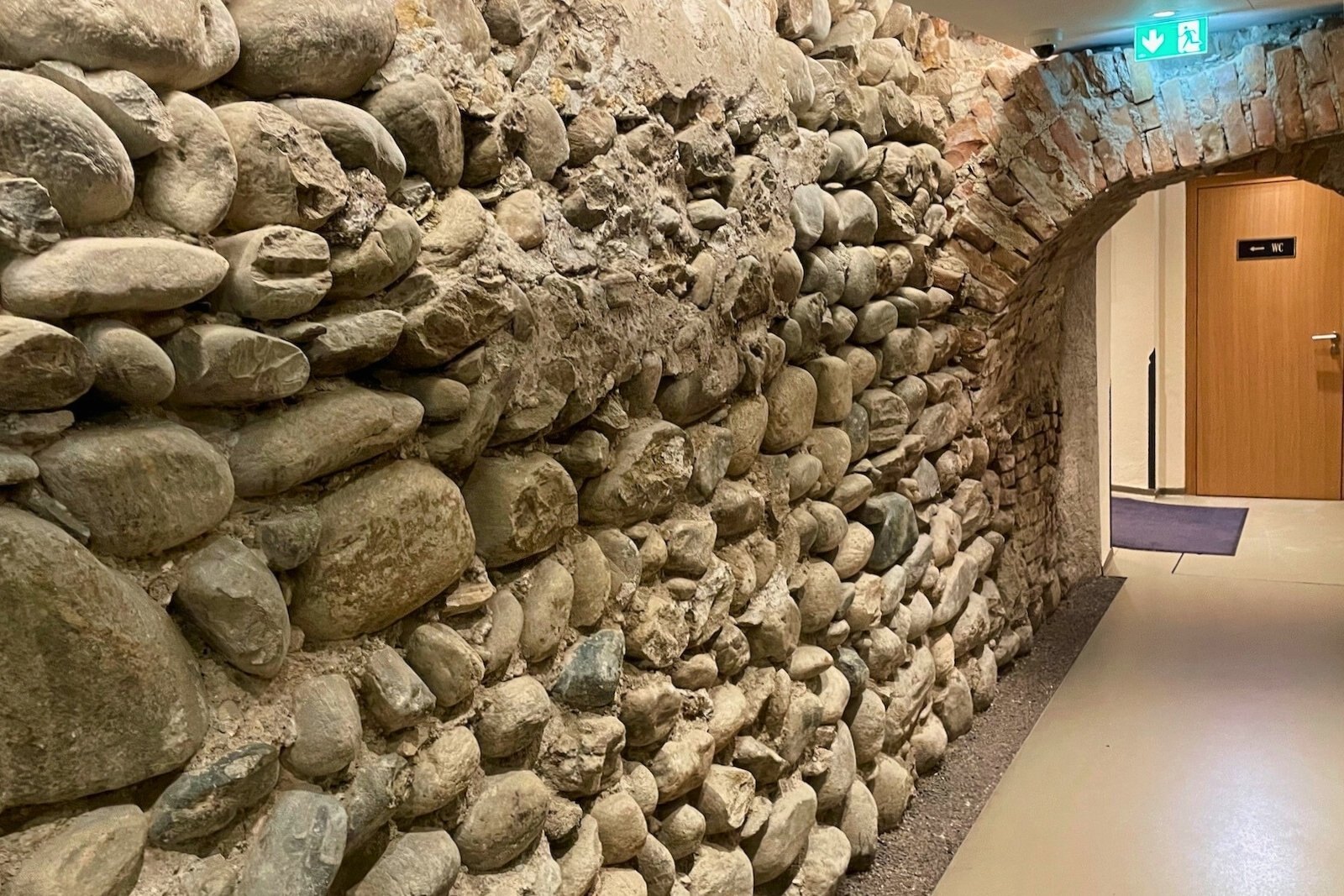 The old stones in the hall to the bathroom, once the foundation of nunnery Stiftskeller.