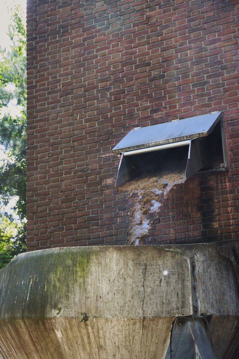 Spent grain exit through the church walls