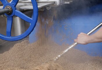 Collecting of waste malt after brewing at Brouwerij Eleven