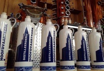 Ceramic bottles of jenever in Hoofdvaartkerk distillery