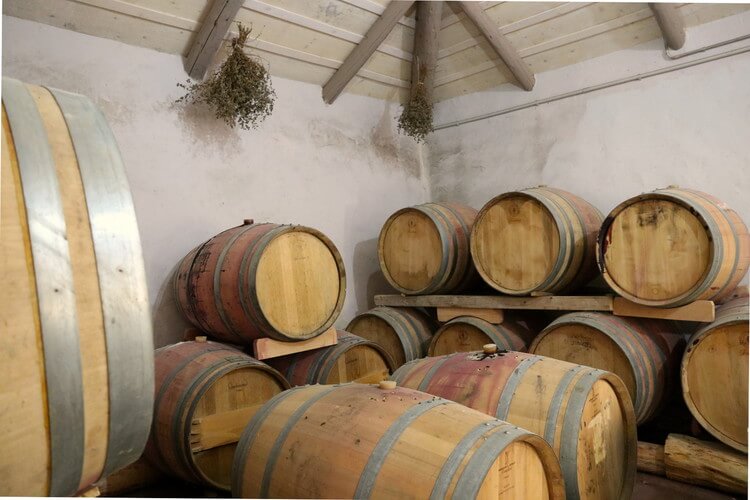 Aging red wine in barrels